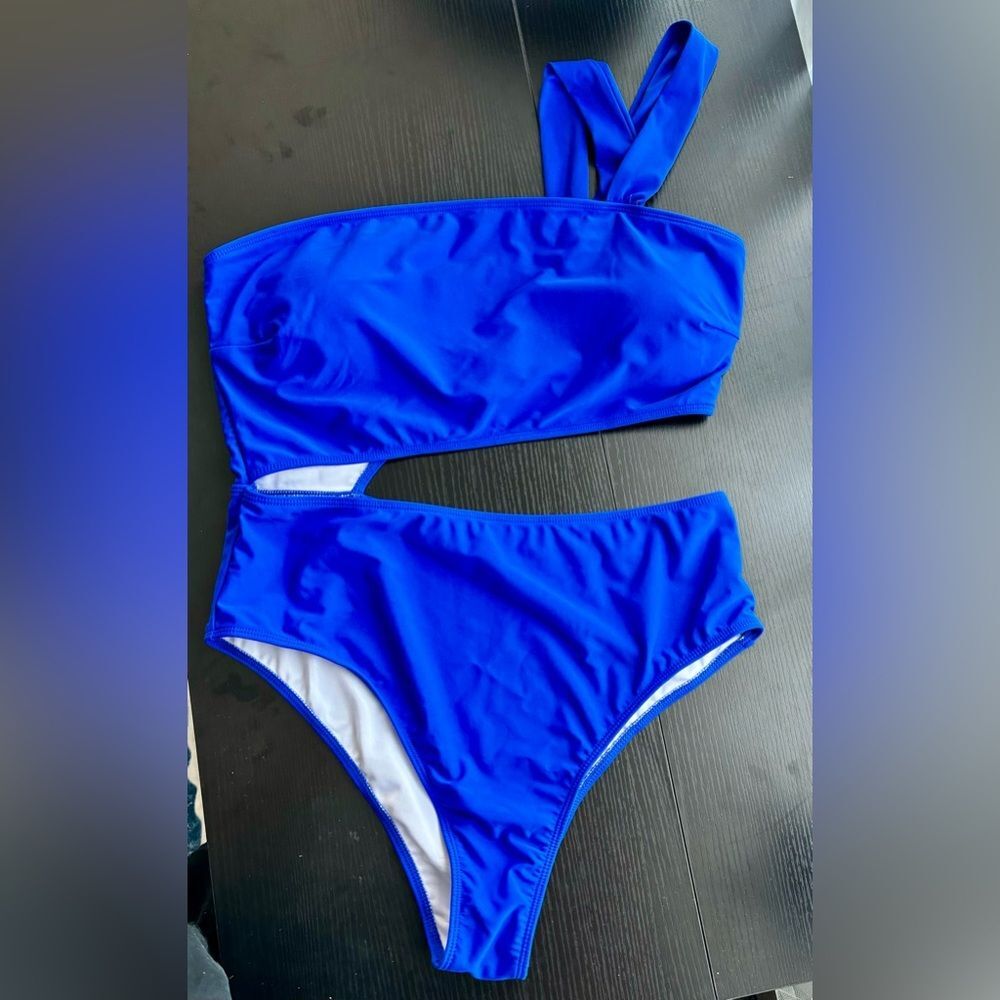 Asymmetrical Blue One Piece Swim Suit with Cut Out Waist NWOT